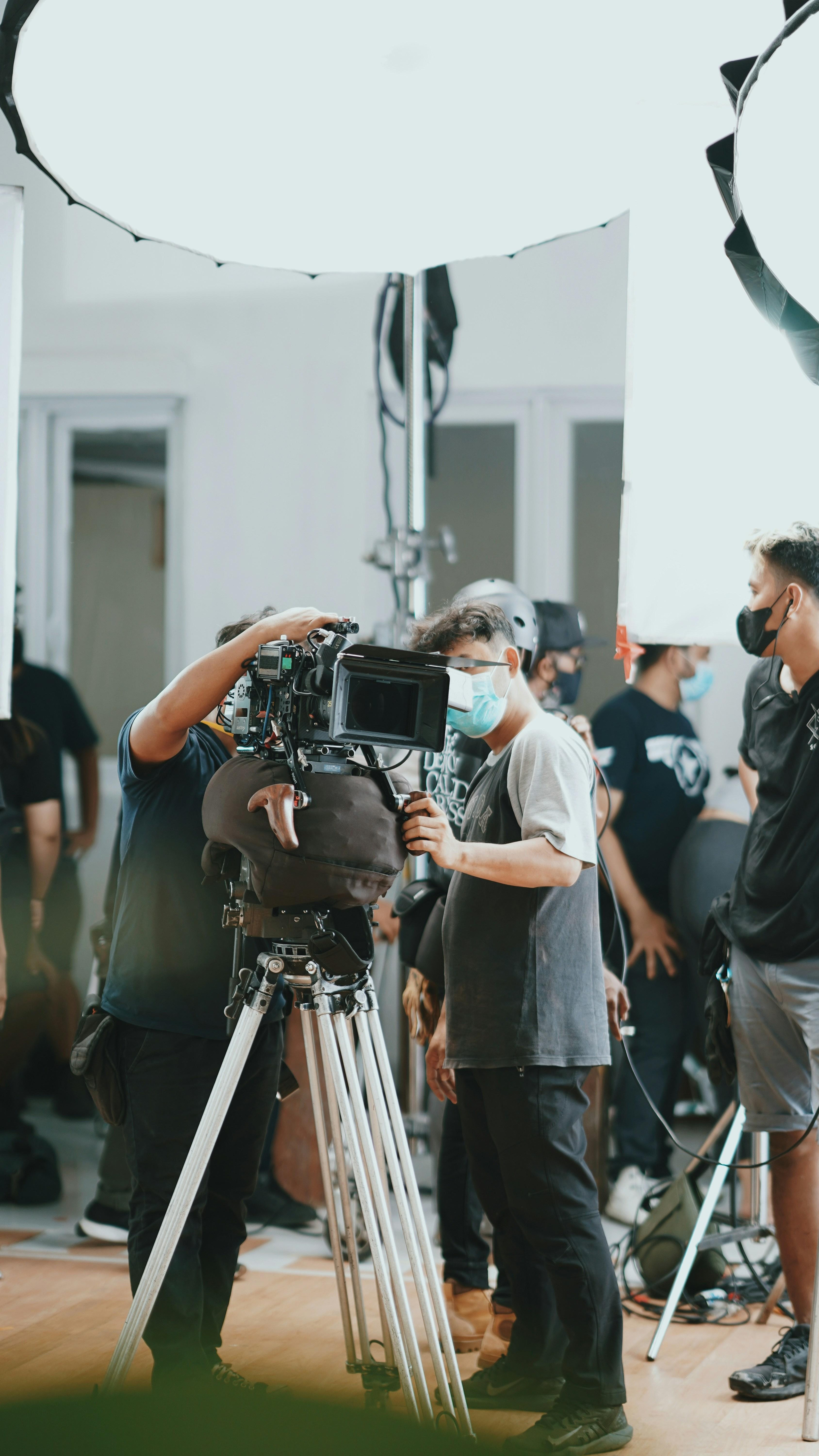 Professional film production set with camera crew